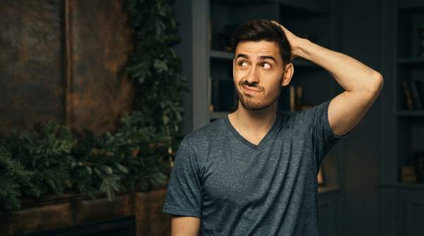 Editorial illustration for Dandruff or Dry Scalp? How to Tell Them Apart and Pick the Right Shampoo