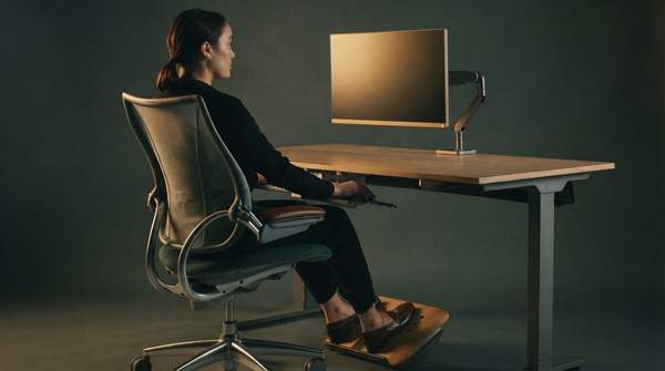 Editorial illustration for Setting Up a Pain-Free Home Office: A Step-by-Step Ergonomic Checklist