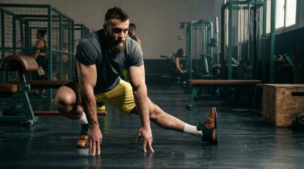Editorial illustration for Three Essential Stretches Men Should Do Daily to Loosen Tight Chest, Hamstrings, and Hips